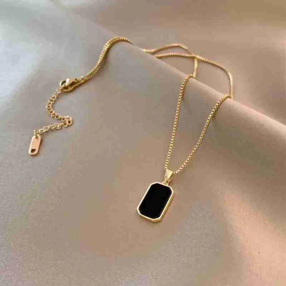 Reversible Gold Rectangle Pendant Necklace – Black Onyx & White Mother of Pearl